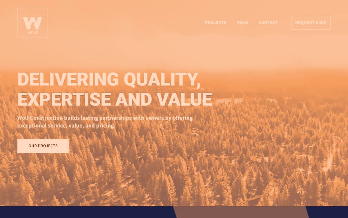 The home page of Wolf Construction: the headline 'Delivering quality, expertise and value' over an aerial view of snowy pine forest, printed as a peach duotone card.